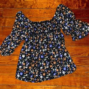 Black floral smocked peplum top